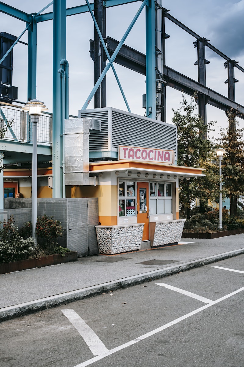 Small commerce building with signboard in suburb